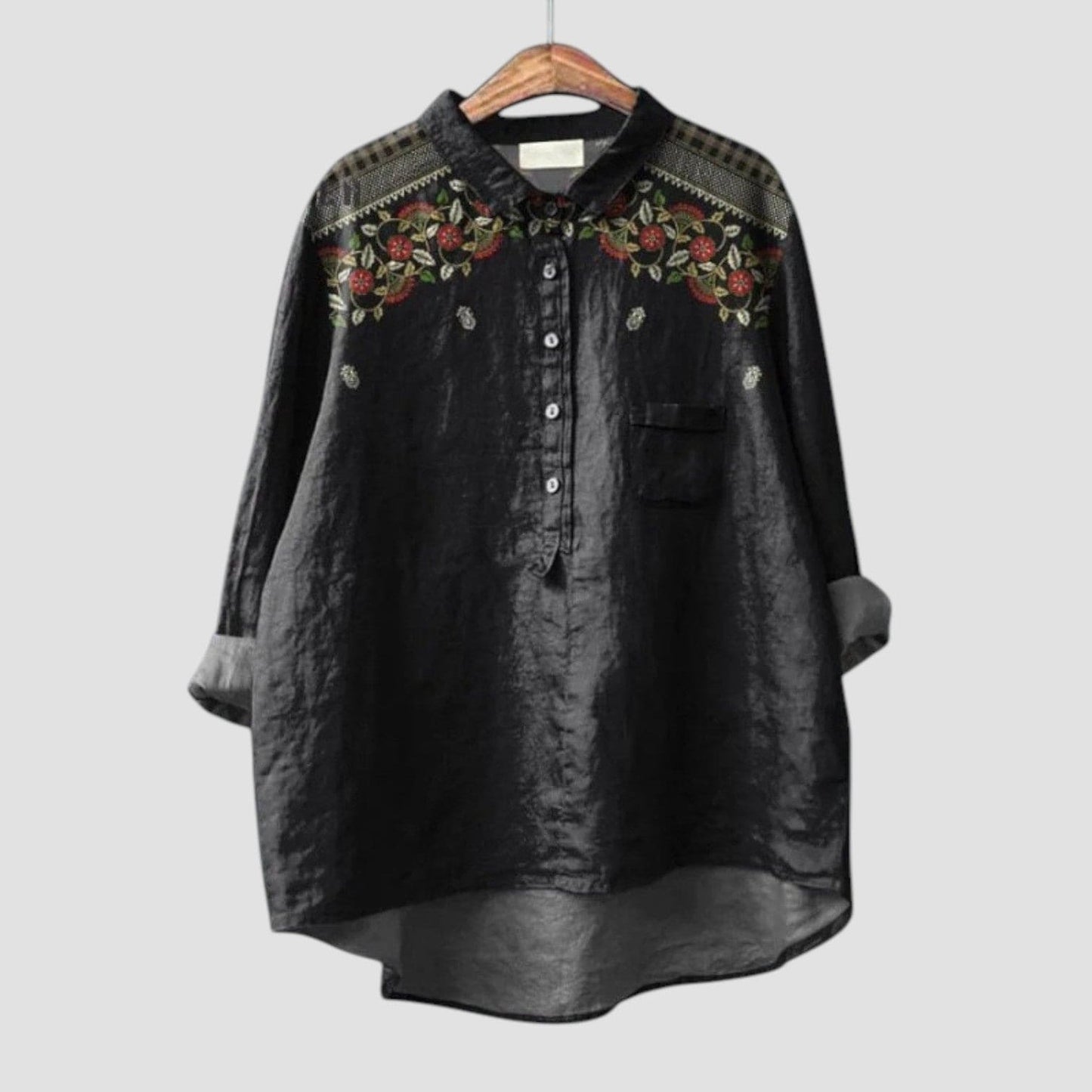 Carina ⏐ Blusa negra oversize con bordado floral para un estilo elegante y relajado