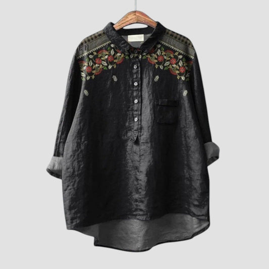 Carina ⏐ Blusa negra oversize con bordado floral para un estilo elegante y relajado